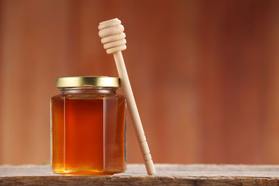 Close-up of honey in jar on table