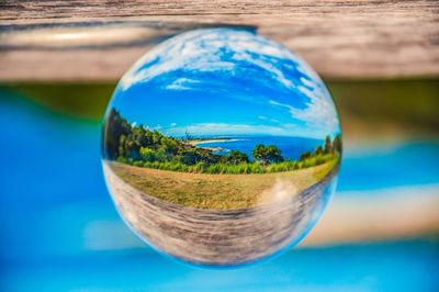 Close-up of crystal ball in swimming pool