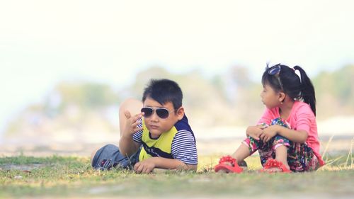 Boys friends on shore