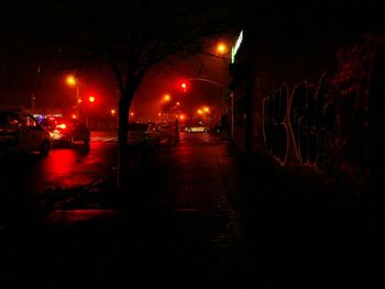 Illuminated street at night