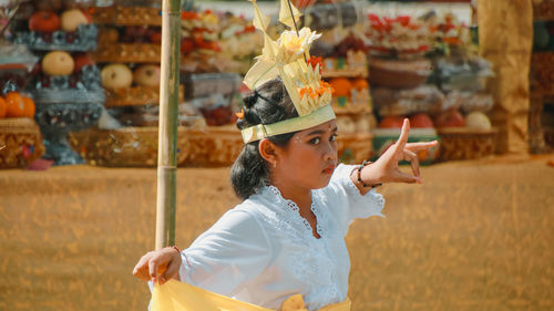 Side view of young woman looking away