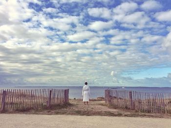 Scenic view of sea against cloudy sky