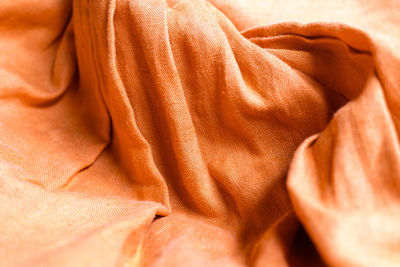 Orange linen fabric texture background , autumn beginning backdrops