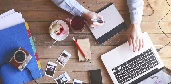 Illustrator working at home using a graphics tablet