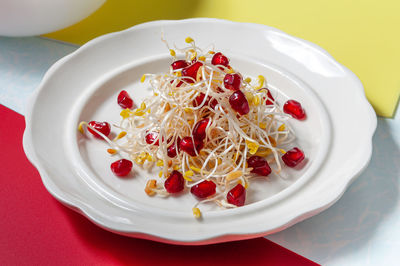 High angle view of fruits in plate on table