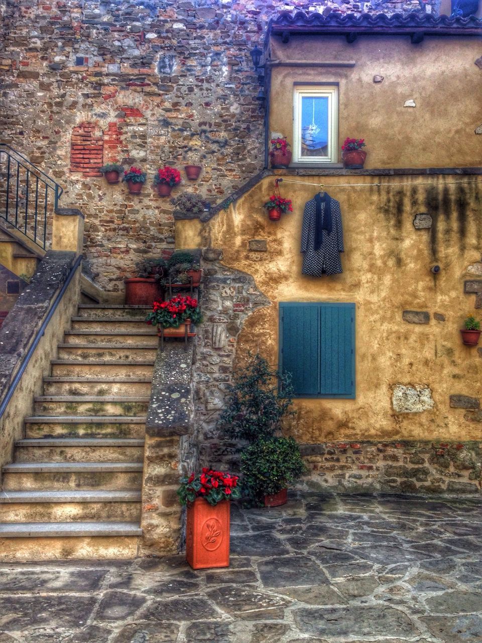 architecture, building exterior, built structure, window, house, wall - building feature, brick wall, flower, potted plant, plant, red, wall, residential structure, door, residential building, growth, day, flower pot, no people, outdoors