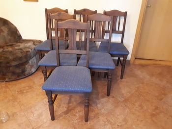 High angle view of empty chairs and tables at home