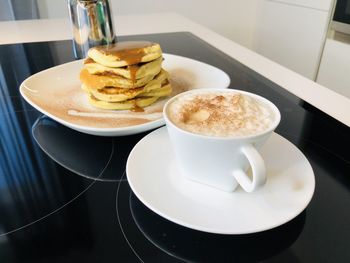 Close-up of coffee on table