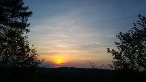 Scenic view of landscape at sunset