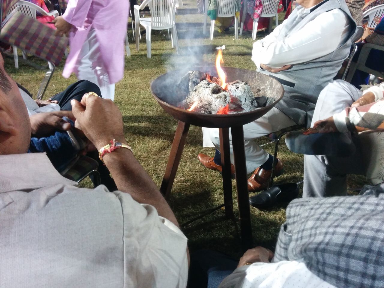 Man sitting near fire