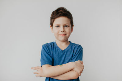 Portrait of young man against white background