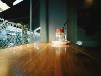 Illuminated lamp on table