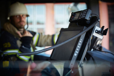 Monitoring equipment against defocused firefighter in fire truck