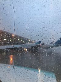 Close-up of wet window in rainy season