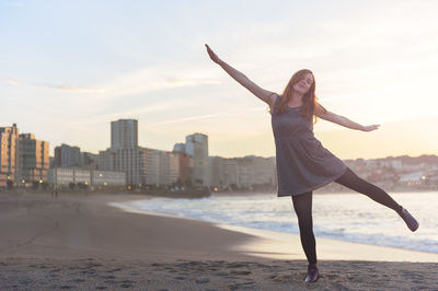 Woman posing on beach