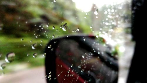 Close-up of raindrops on glass window