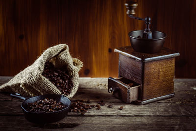 Close-up of coffee beans on table