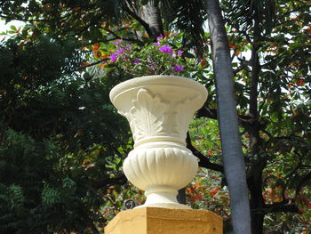 Close-up of statue against plants