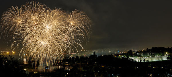 Firework display at night