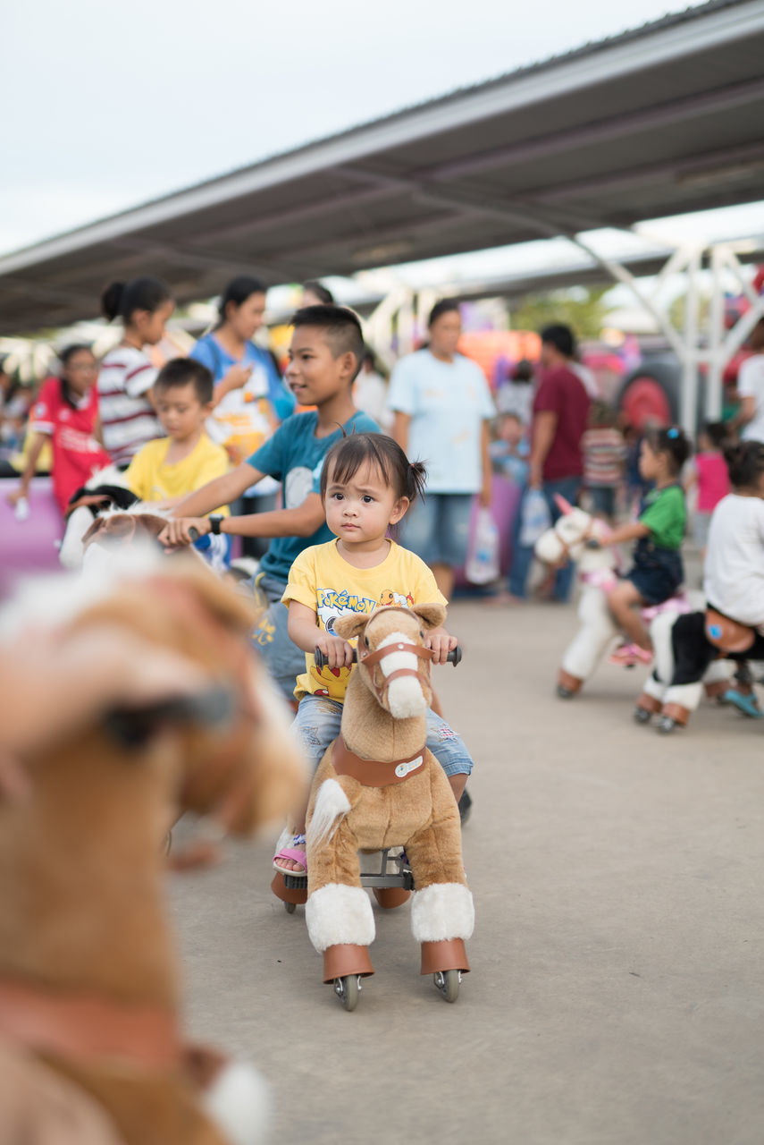 CLOSE-UP OF CHILDREN IN PARK