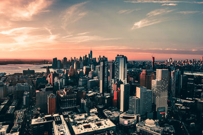 High angle view of city at sunset