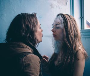 Side view of couple kissing