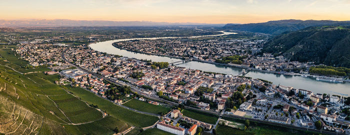 High angle view of cityscape against sky during sunset