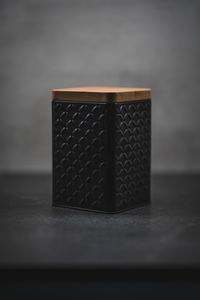 Close-up of table against black background