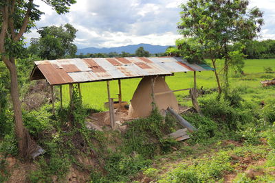 House on field against sky