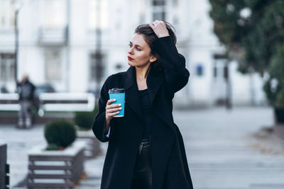 Young woman looking at camera