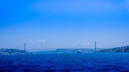 Suspension bridge over river