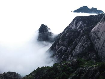 Scenic view of rocky mountains against sky