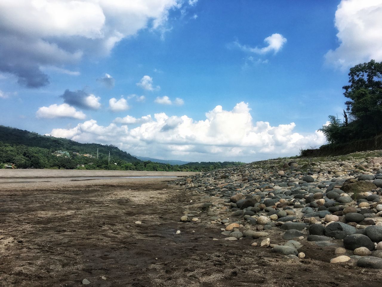 sky, cloud - sky, tranquil scene, tranquility, scenics - nature, beauty in nature, day, nature, environment, land, landscape, no people, non-urban scene, rock, solid, mountain, stone - object, outdoors, rock - object, tree, pebble, arid climate