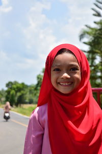 Portrait of a smiling young woman