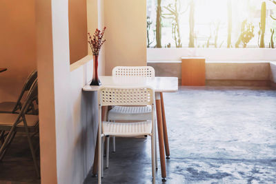 Empty chairs and tables at home