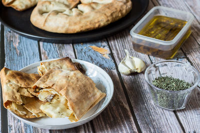 Pizza puff with anchovies. traditional peasant dish.