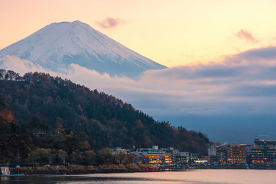 Scenic view of mountains against sky at sunset