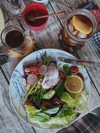 High angle view of fruits in glass on table