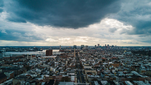 Aerial view of cityscape against sky