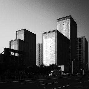 Modern buildings against sky in city