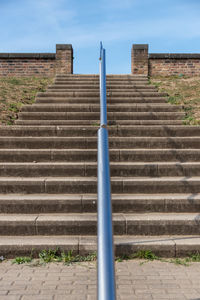 Low angle view of staircase against sky