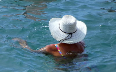 High angle view of woman in swimming pool