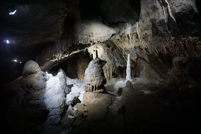 Low angle view of statue in cave