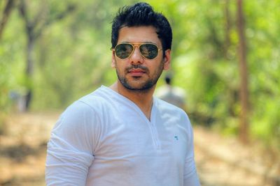 Young man wearing aviator glasses