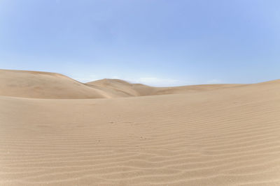 Scenic view of desert against sky