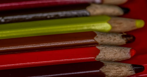 Close-up of colored pencils on table