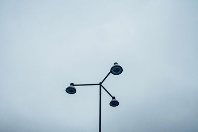 Low angle view of street light against clear sky