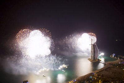 Firework display at night