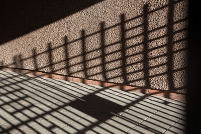 Shadow of built structure against sky