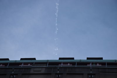 Low angle view of built structure against blue sky